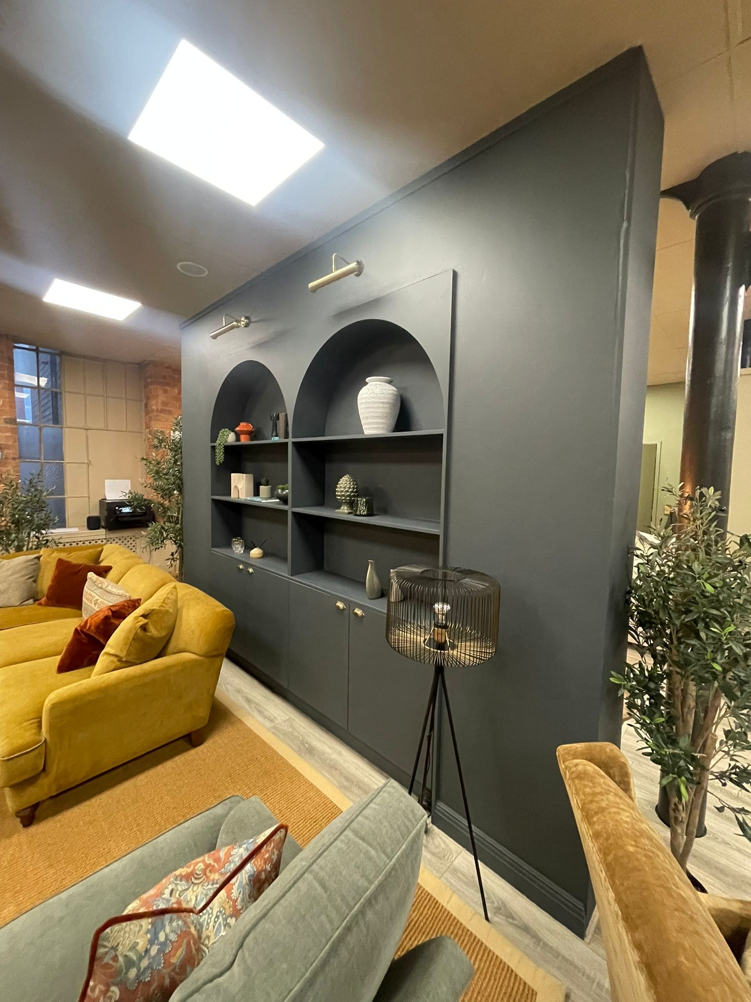 A finished showroom lounge display with fitted built-ins