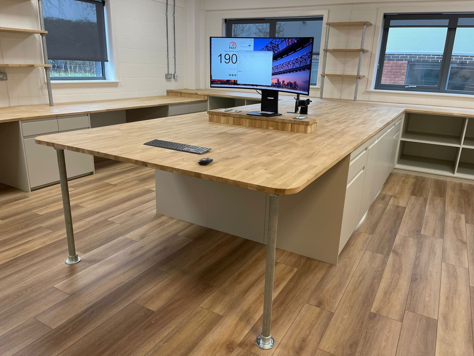 Jointed oak desk on galvanised legs